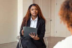 female healthcaare administrator with a clipboard
