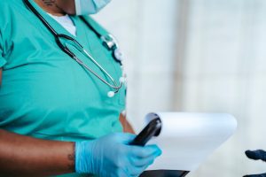 A nurse holding a clipboard